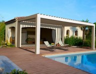 PERGOLA BIOCLIMATICA A LAMELLE ORIENTABILI ADDOSSATA PERGOKLIMA R610